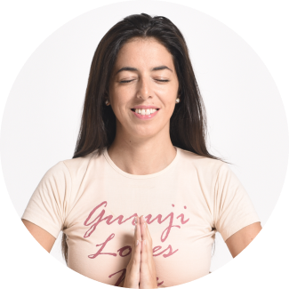 Meditating A smiling female with closed eyes is meditating
