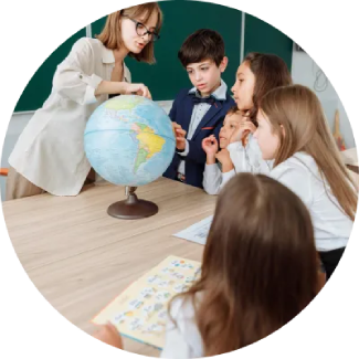 Value Education Teacher guiding four attentive children at a table, emphasizing life skills through ART Excel.